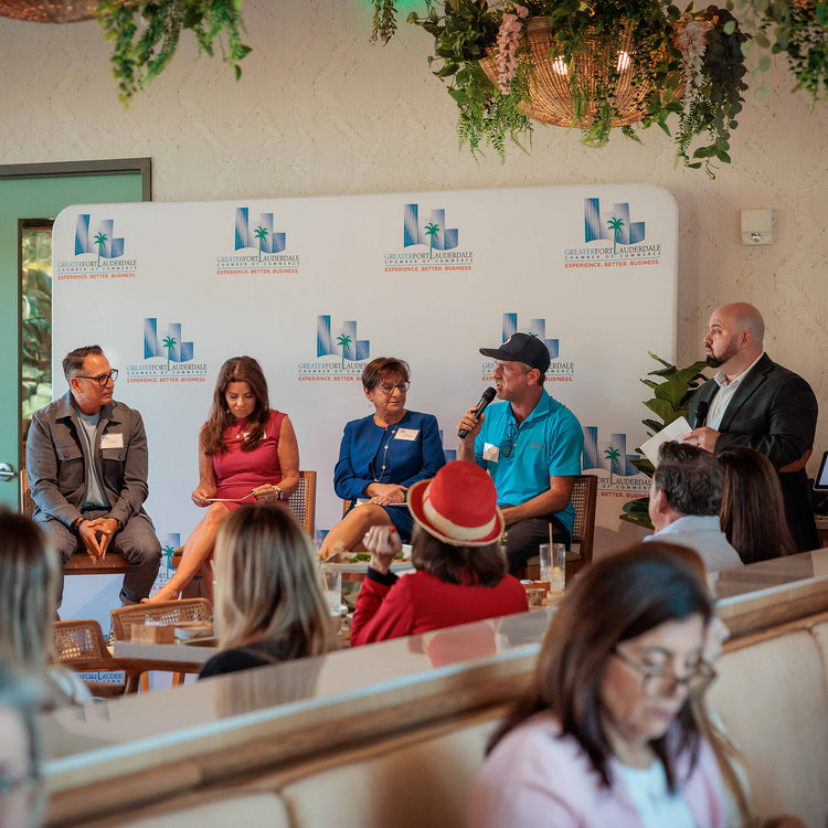 Panel discussion with speakers at a private event inside The Fort