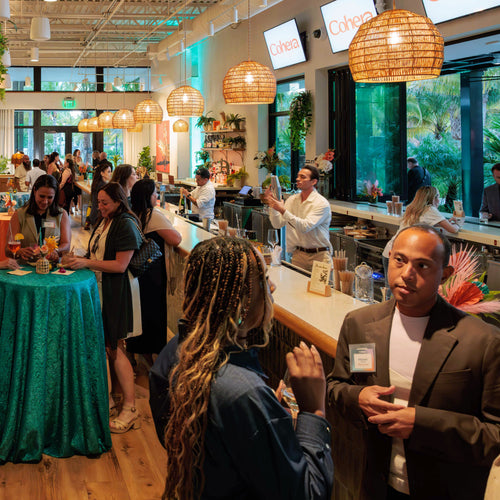 Guests socializing at a private event inside a bar at The Fort
